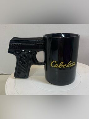 Cabela’s Black Pistol Grip Handle Ceramic Coffee Mug.             3309